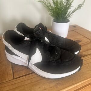 Women’s Nike Black and White Low-Top Swoosh Sneakers